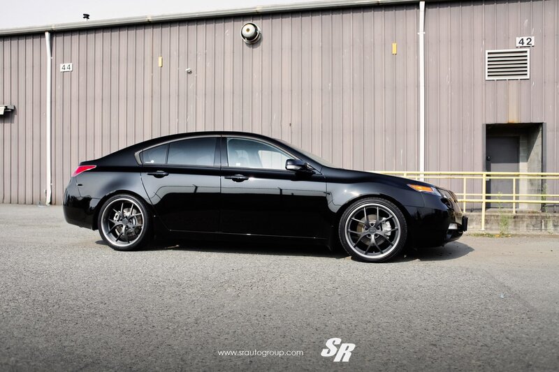 black sedan with custom wheels