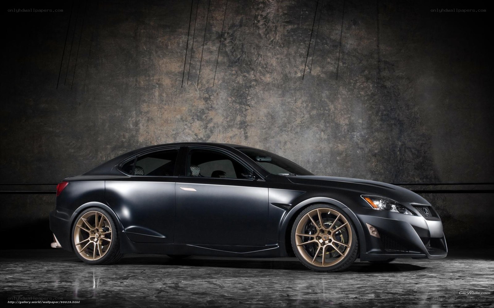 black sedan with gold wheels