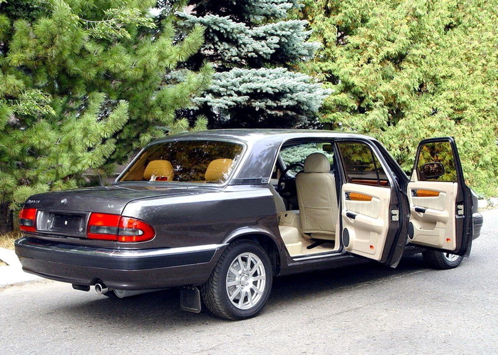 black sedan with open doors