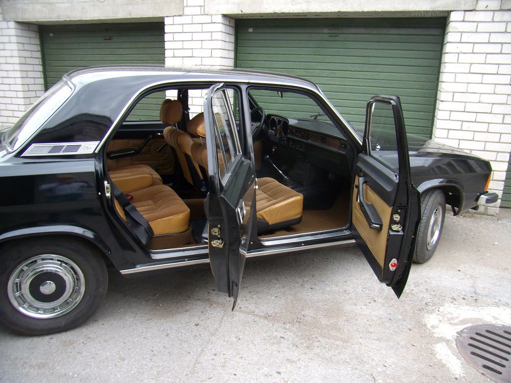 Black sedan with tan interior