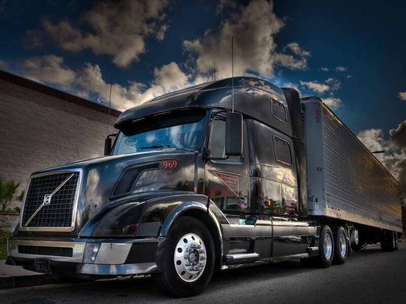Black Semi-truck — Dramatic, Afternoon, Photograph, Clouds