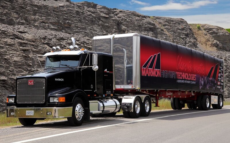 black semi-truck on highway