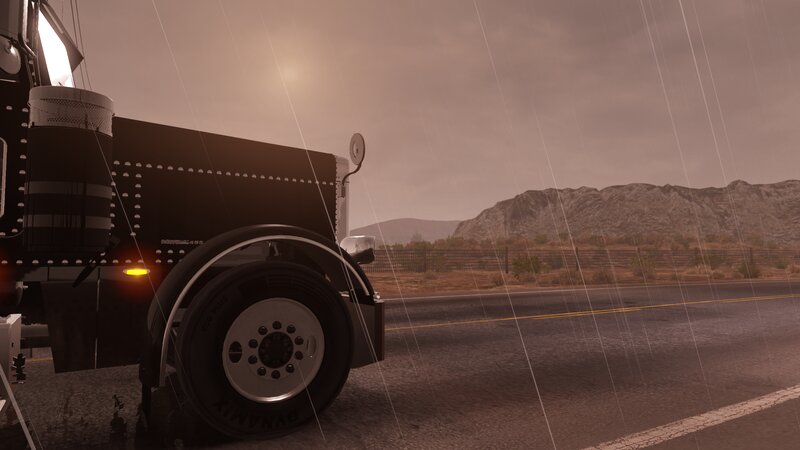 Black Semi-truck on Road — Brown