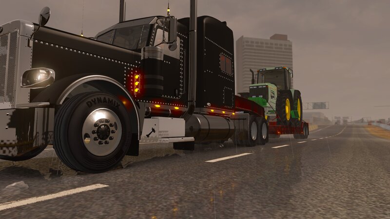 Black Semi-truck Towing Tractor