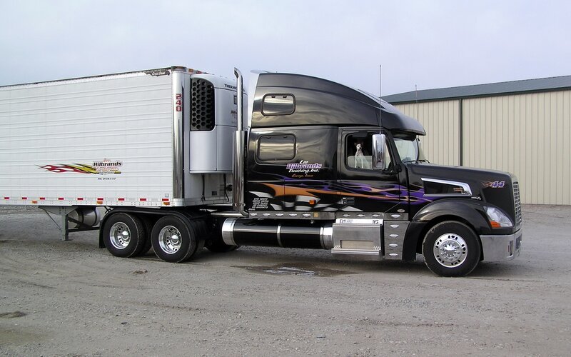 black semi-truck with trailer