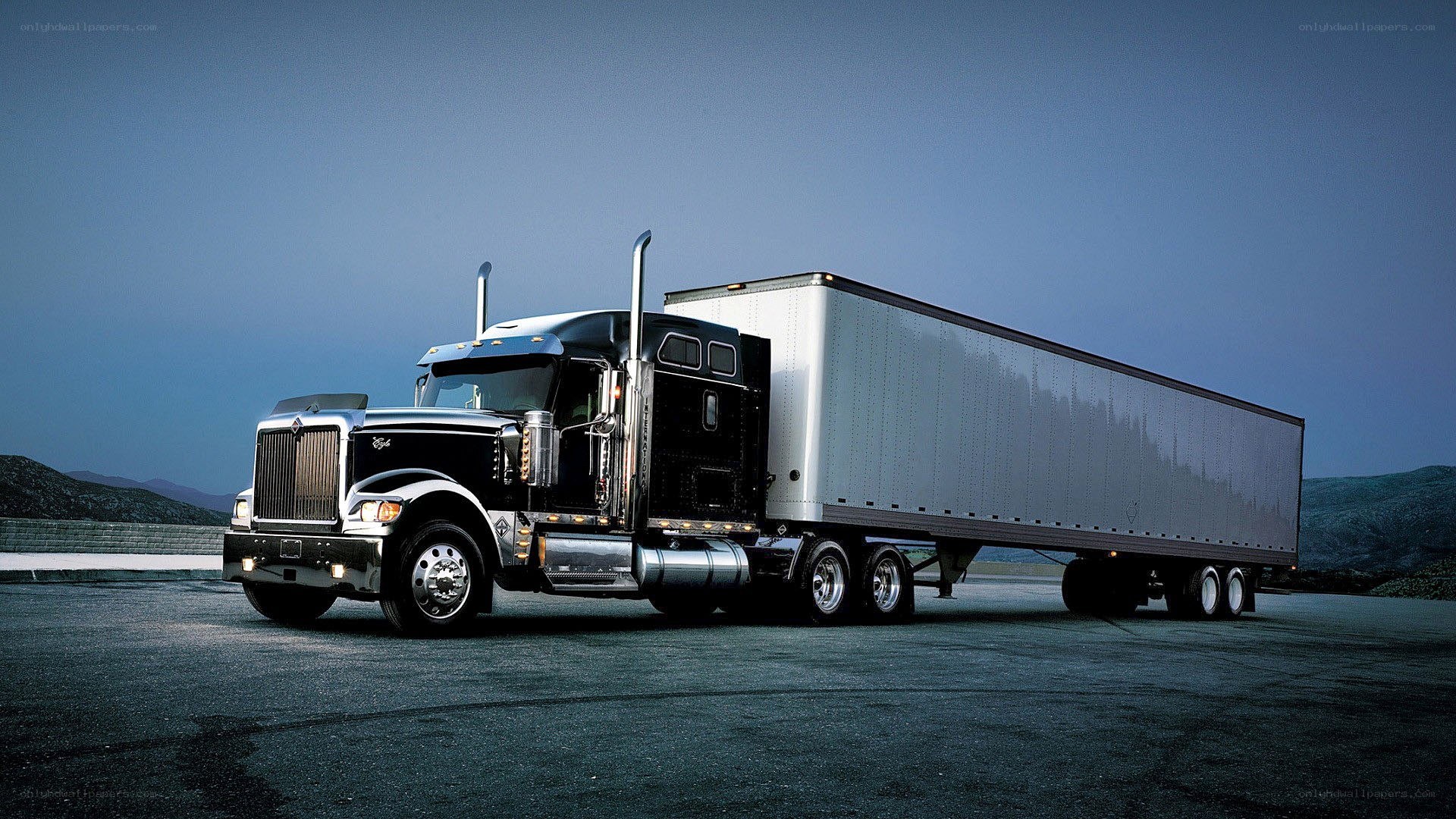 black semi-truck with trailer