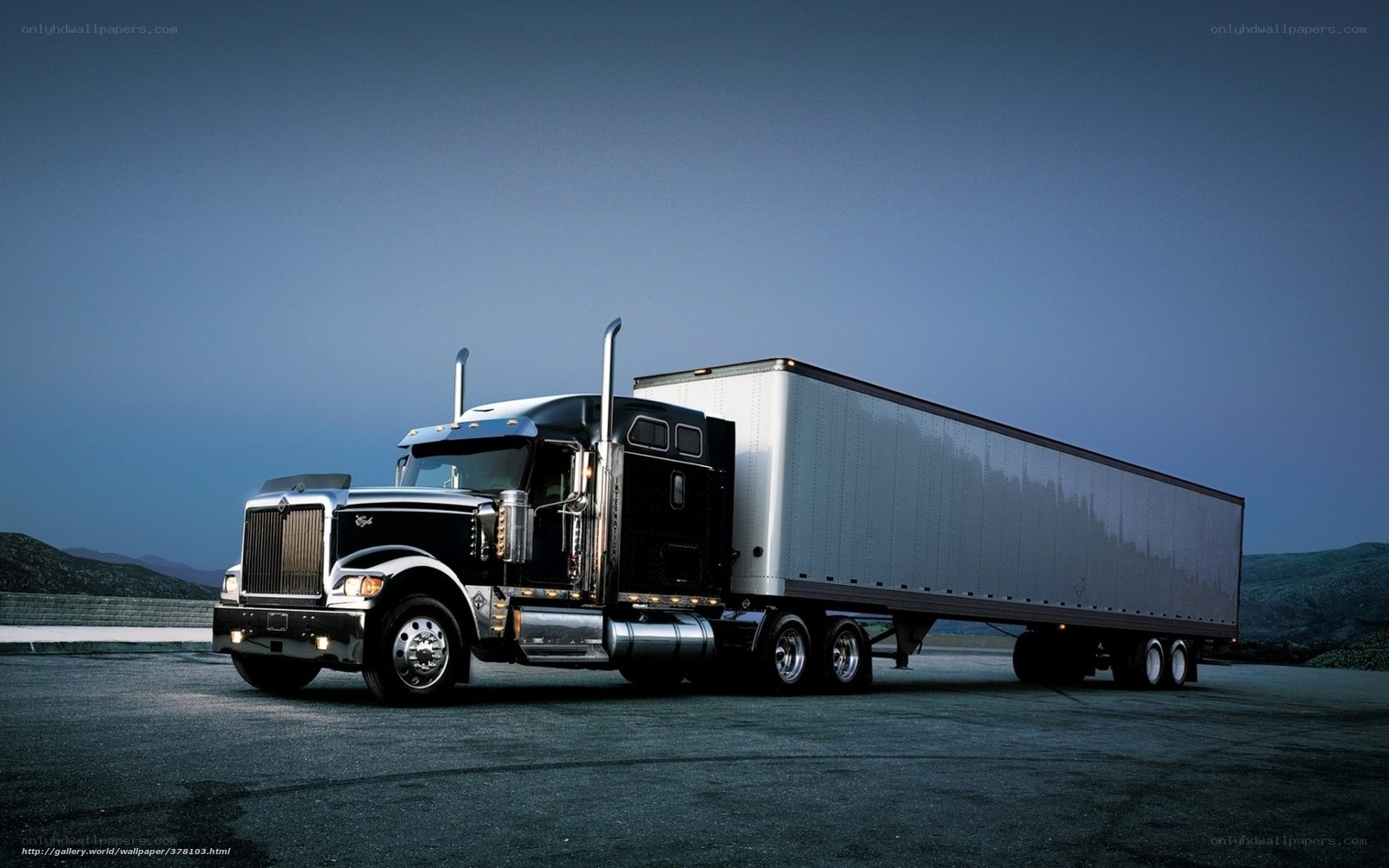 black semi-truck with trailer