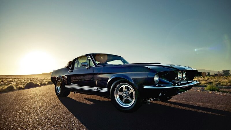Black Shelby GT500 on desert road