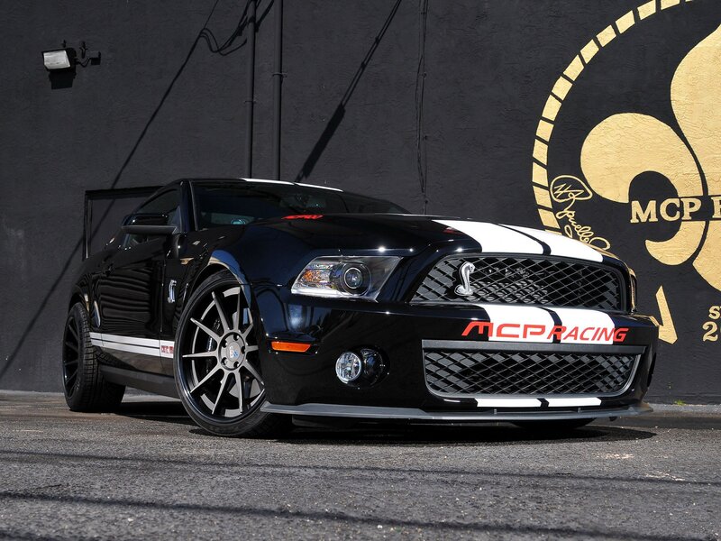 Black Shelby GT500 with racing stripes