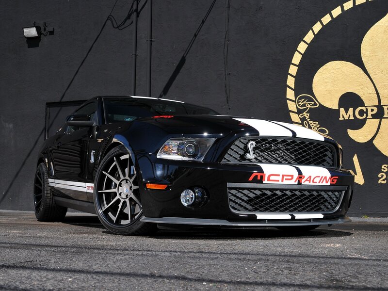Black Shelby GT500 with racing stripes