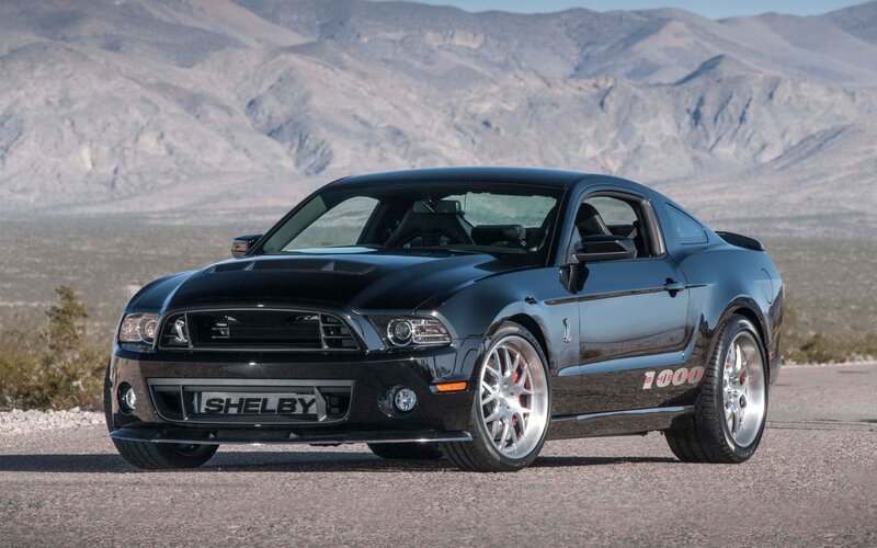 Black Shelby Mustang in desert