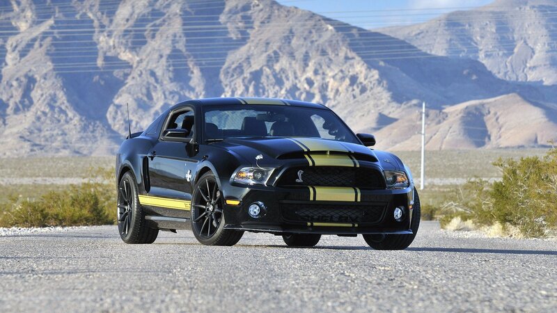 Black Shelby Mustang on desert road