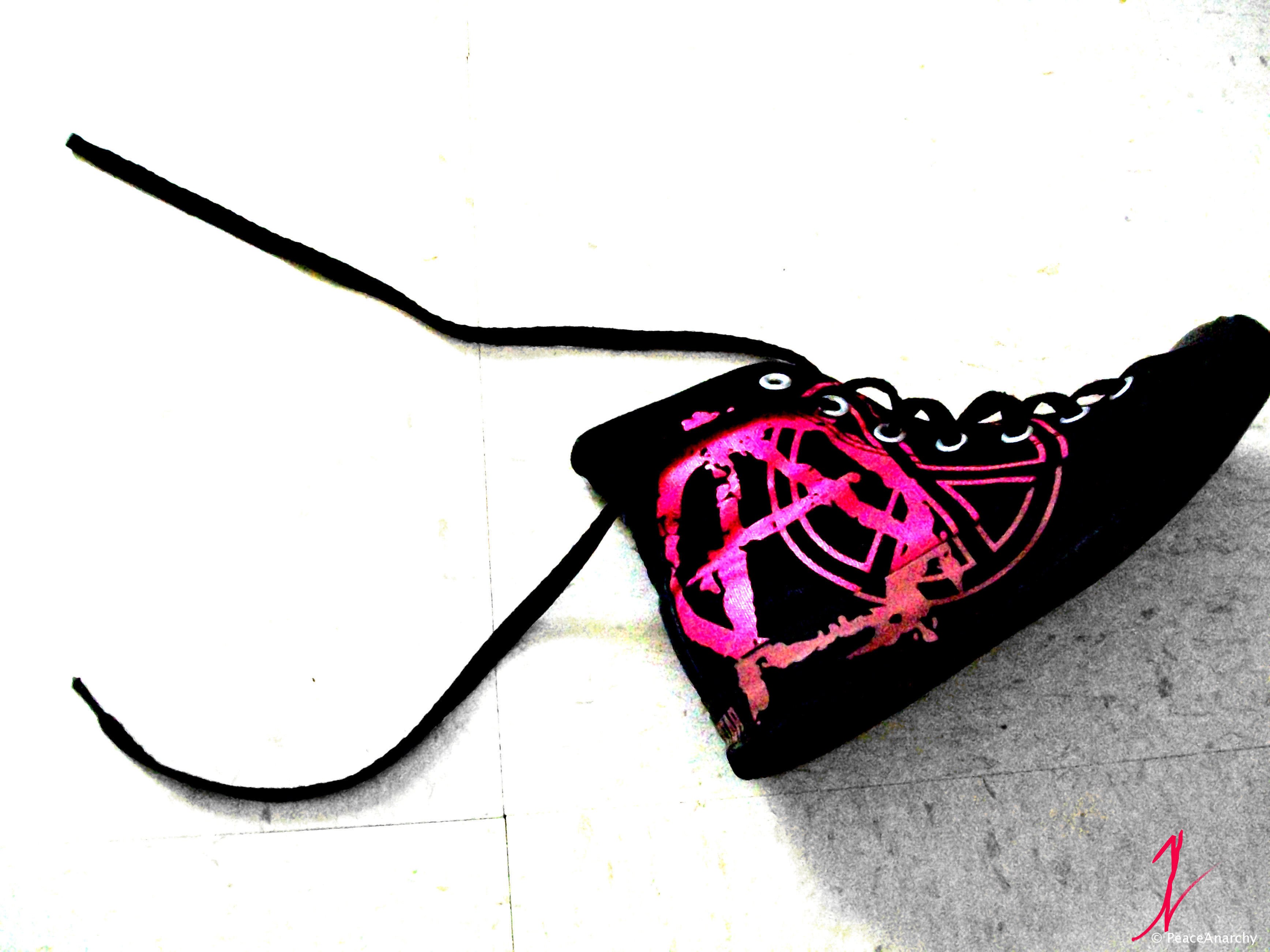 black shoe with pink design