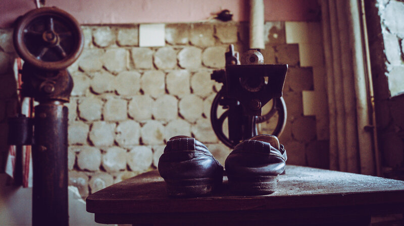 Black Shoes on Table