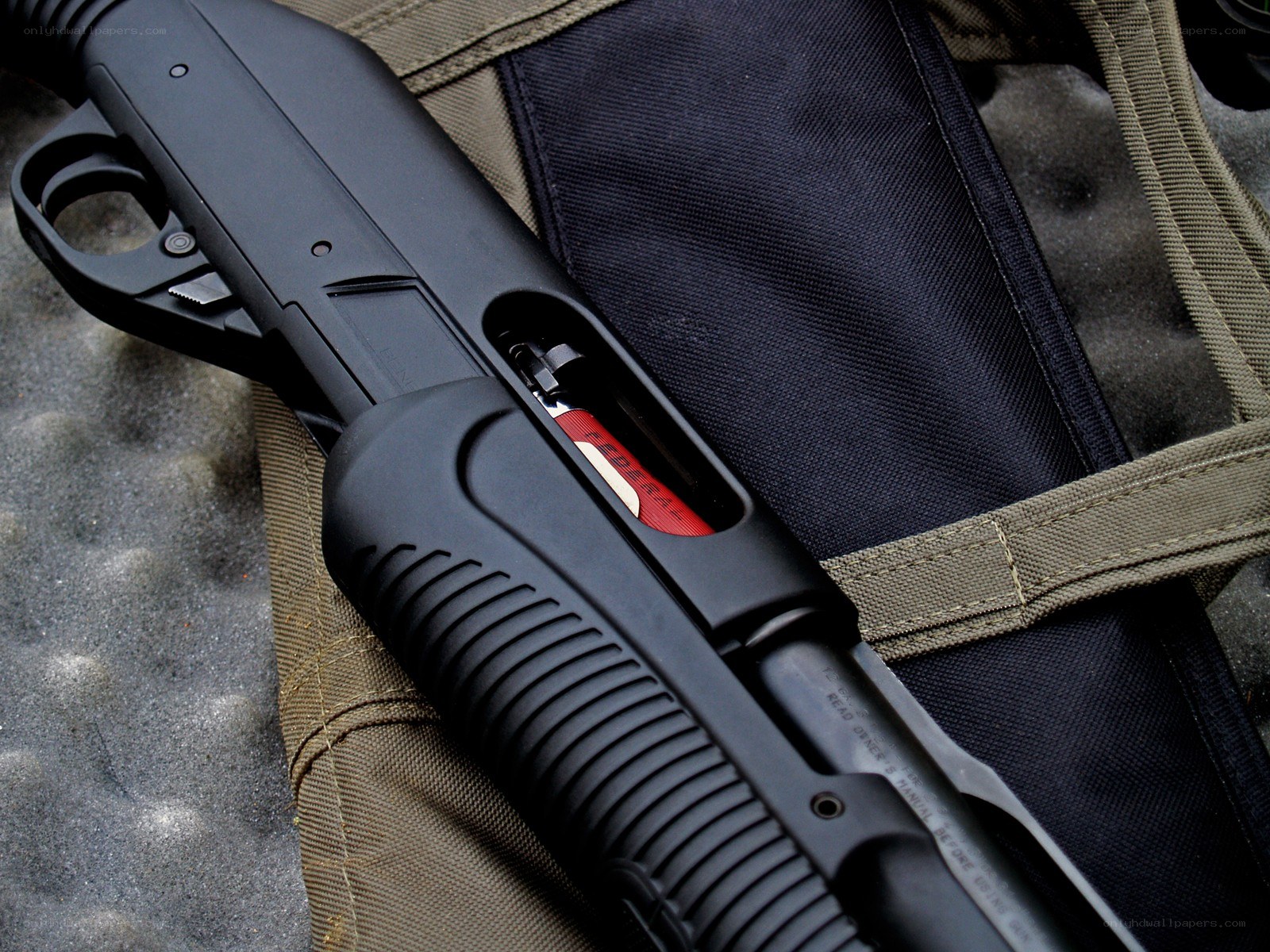 black shotgun in a bag