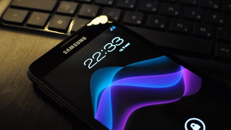 Black Smartphone on Desk — Dark