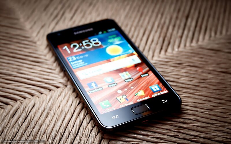 Black Smartphone on Mat