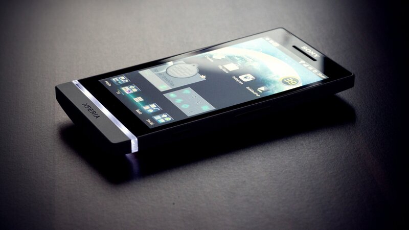Black Smartphone on Surface — Dramatic