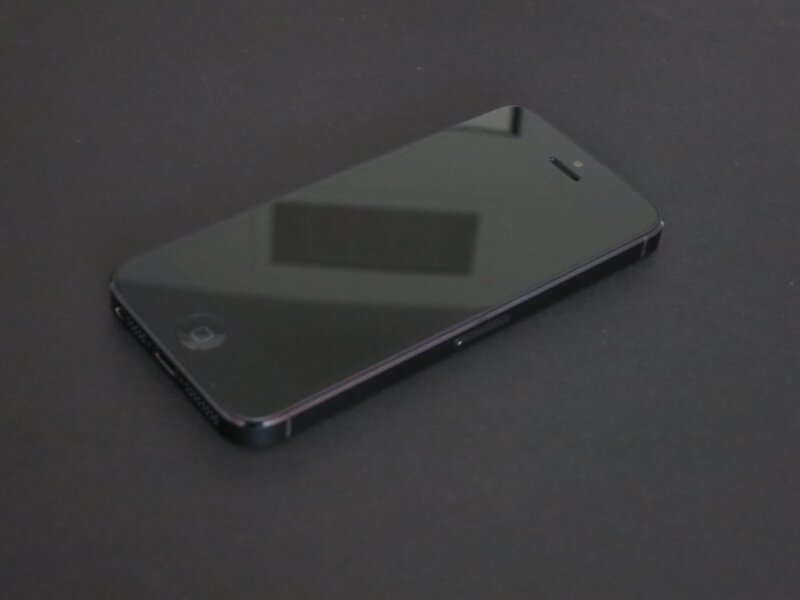 Black Smartphone on Surface — Neutral