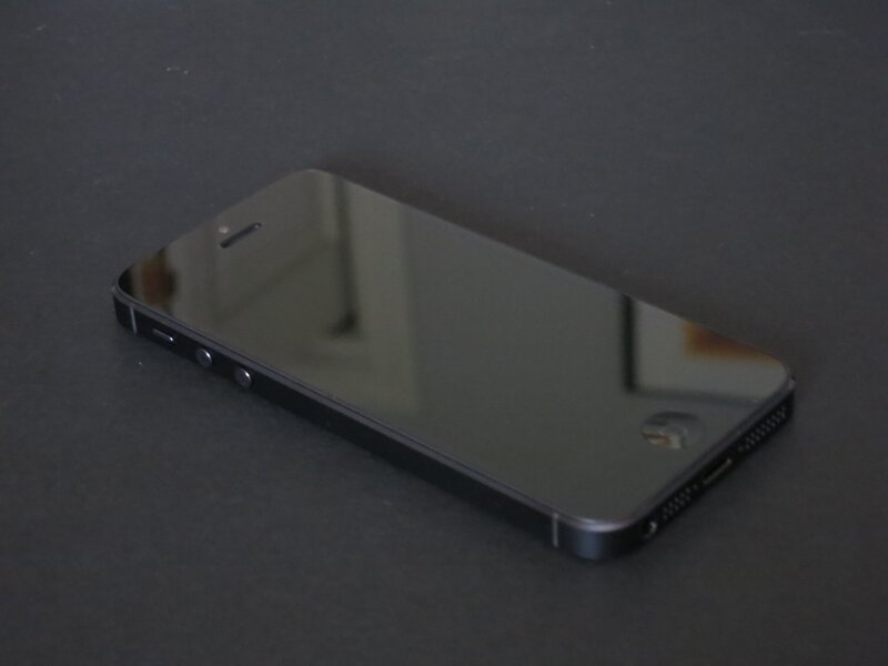 Black Smartphone on Table — Neutral, Photograph, Screen
