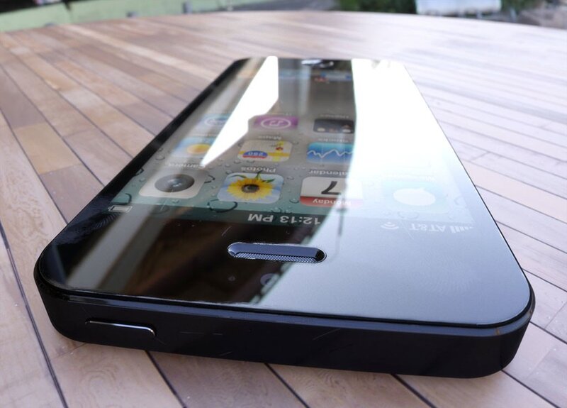 Black Smartphone on Table — Neutral, Photograph, Wooden Surface