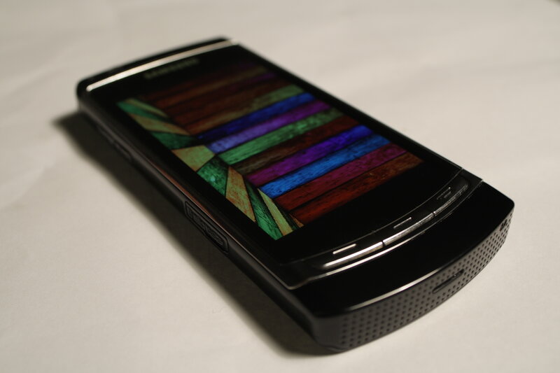 black smartphone with colorful screen