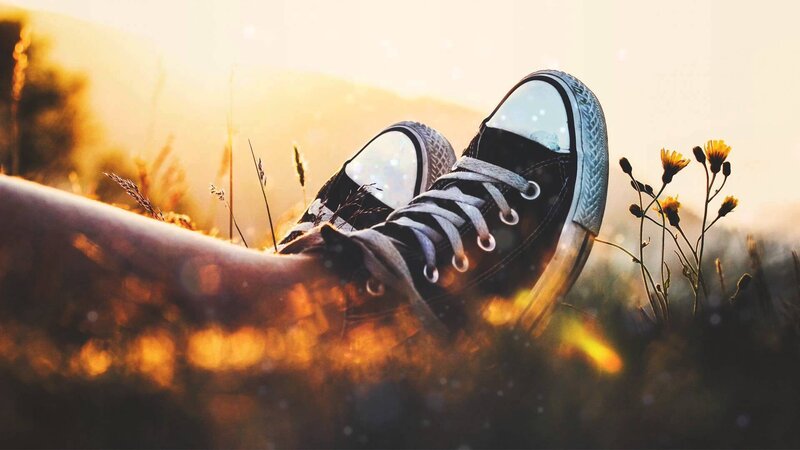 Black Sneakers in Grass