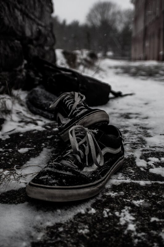 Black Sneakers in Snow