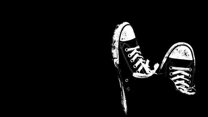 Black Sneakers on Black Background