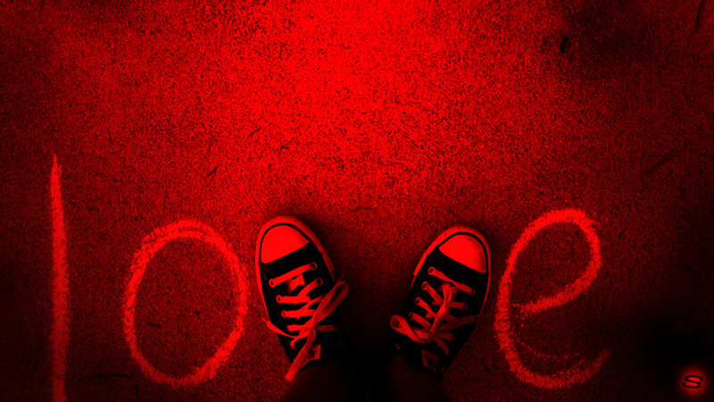 Black Sneakers on Ground