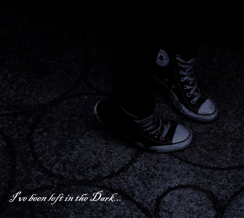 Black Sneakers on Pavement