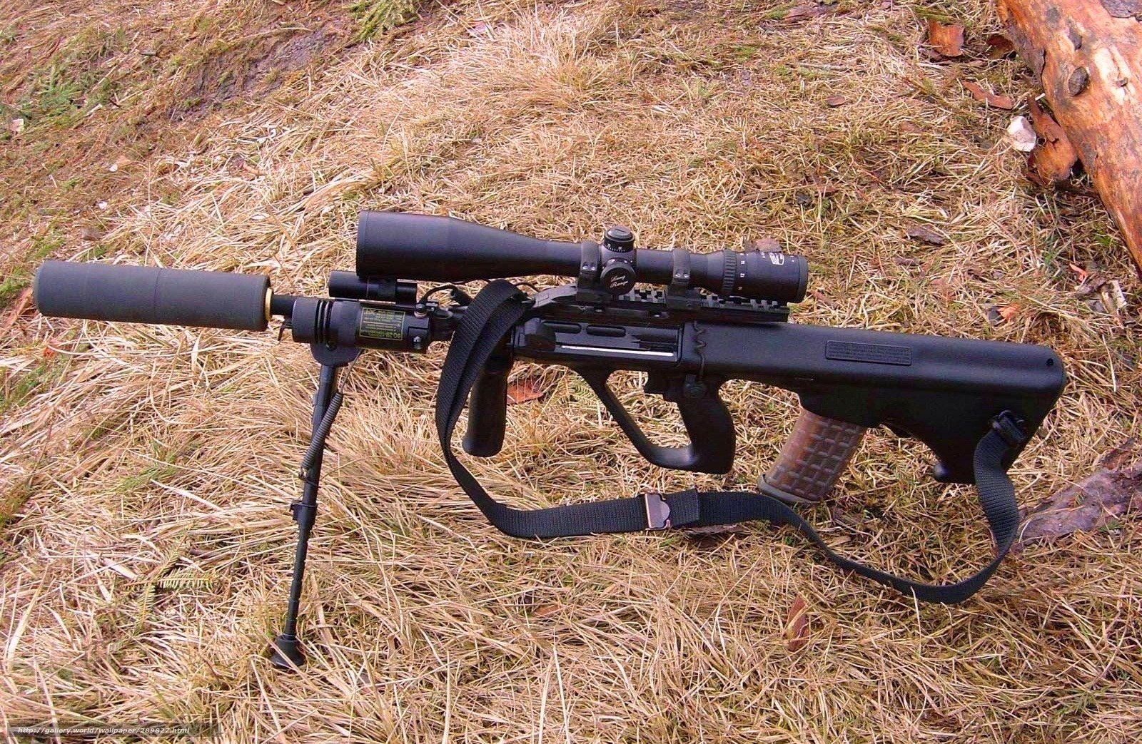 black sniper rifle on grass