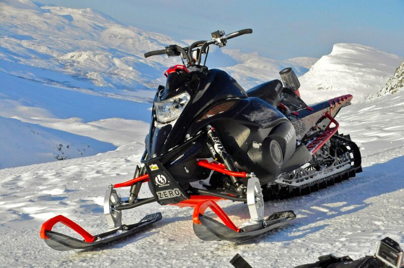 Black Snowmobile on Mountain