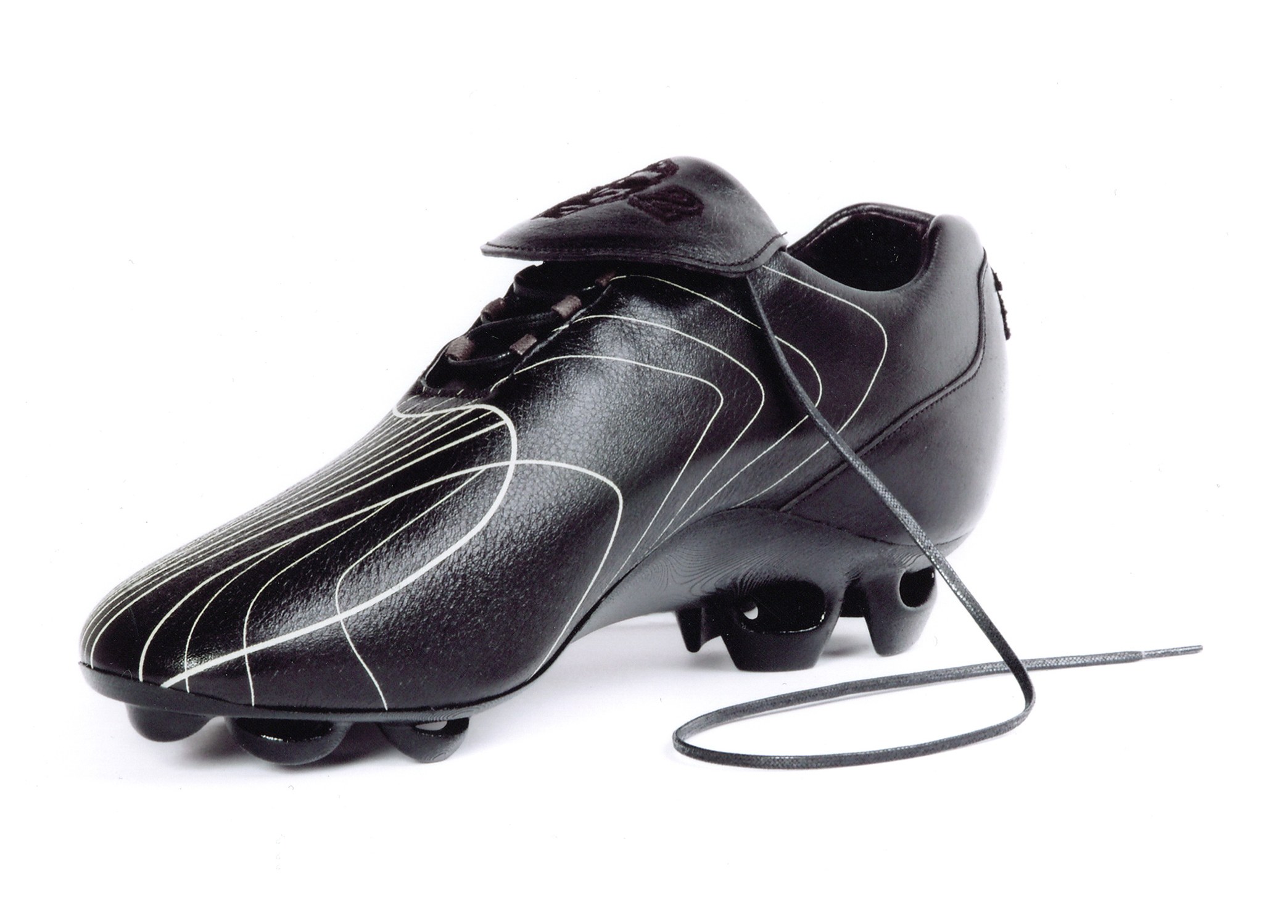 black soccer cleat with white lines