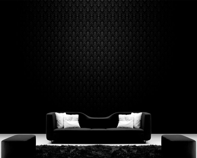 black sofa in dark room