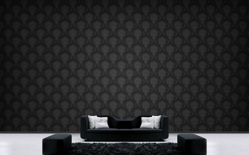 black sofa in patterned room