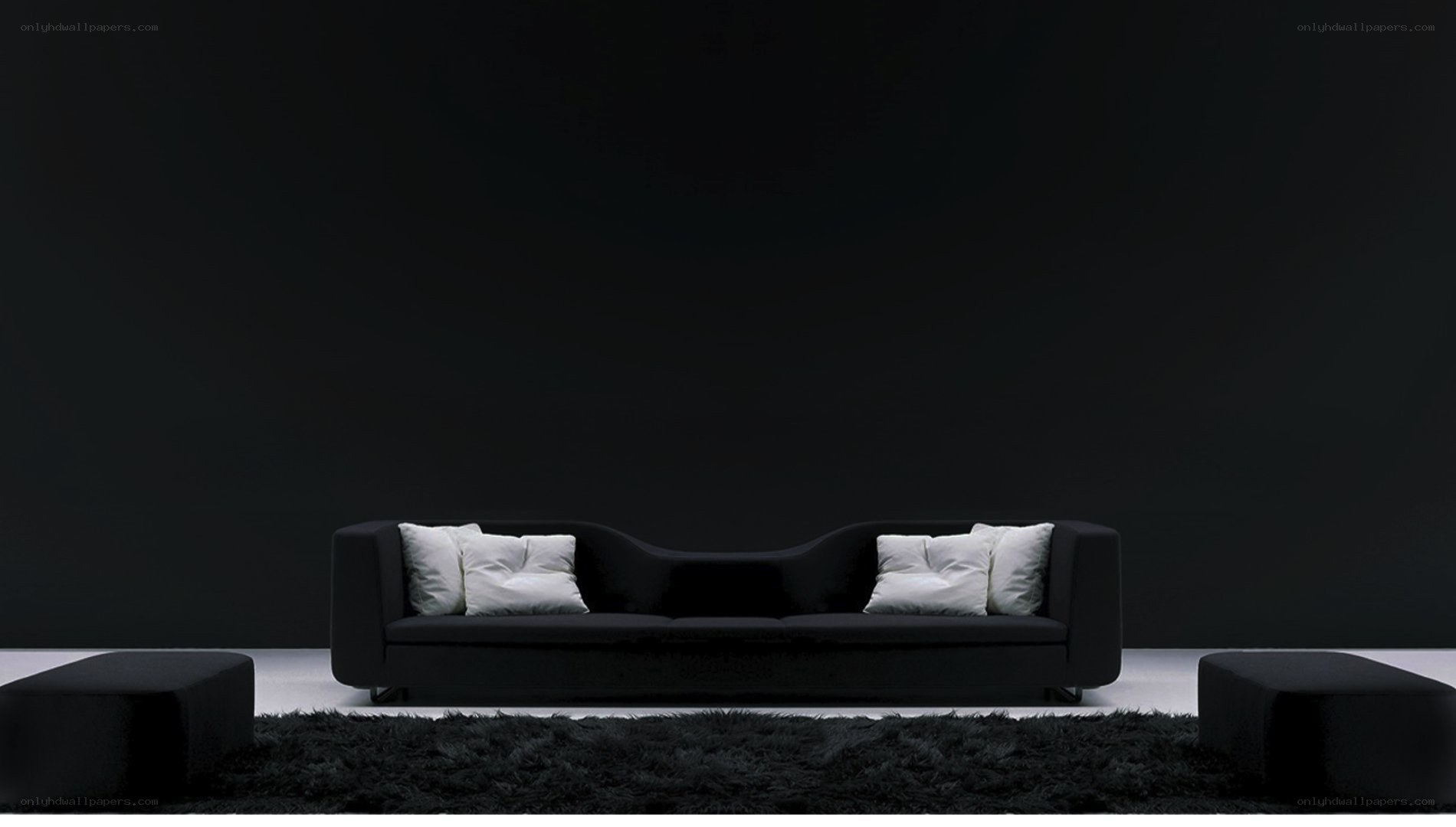 black sofa with white pillows