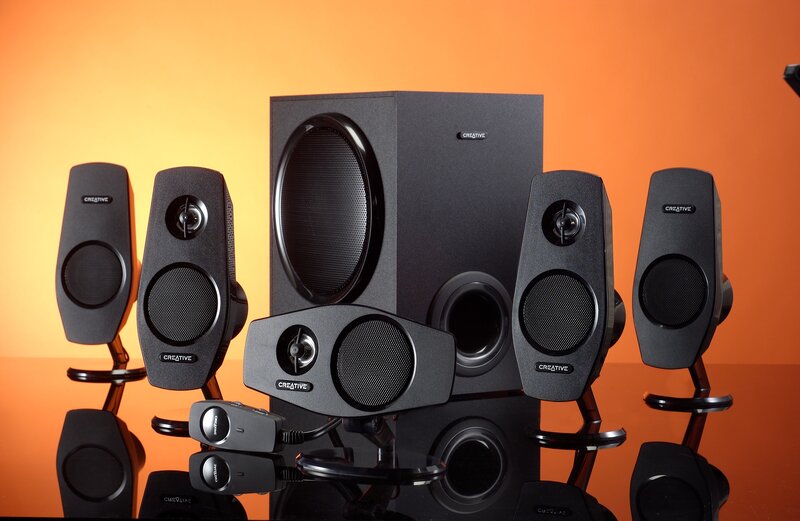 black speaker system on orange