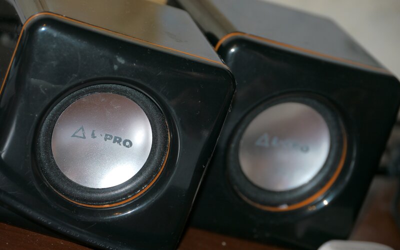 black speakers with silver cones