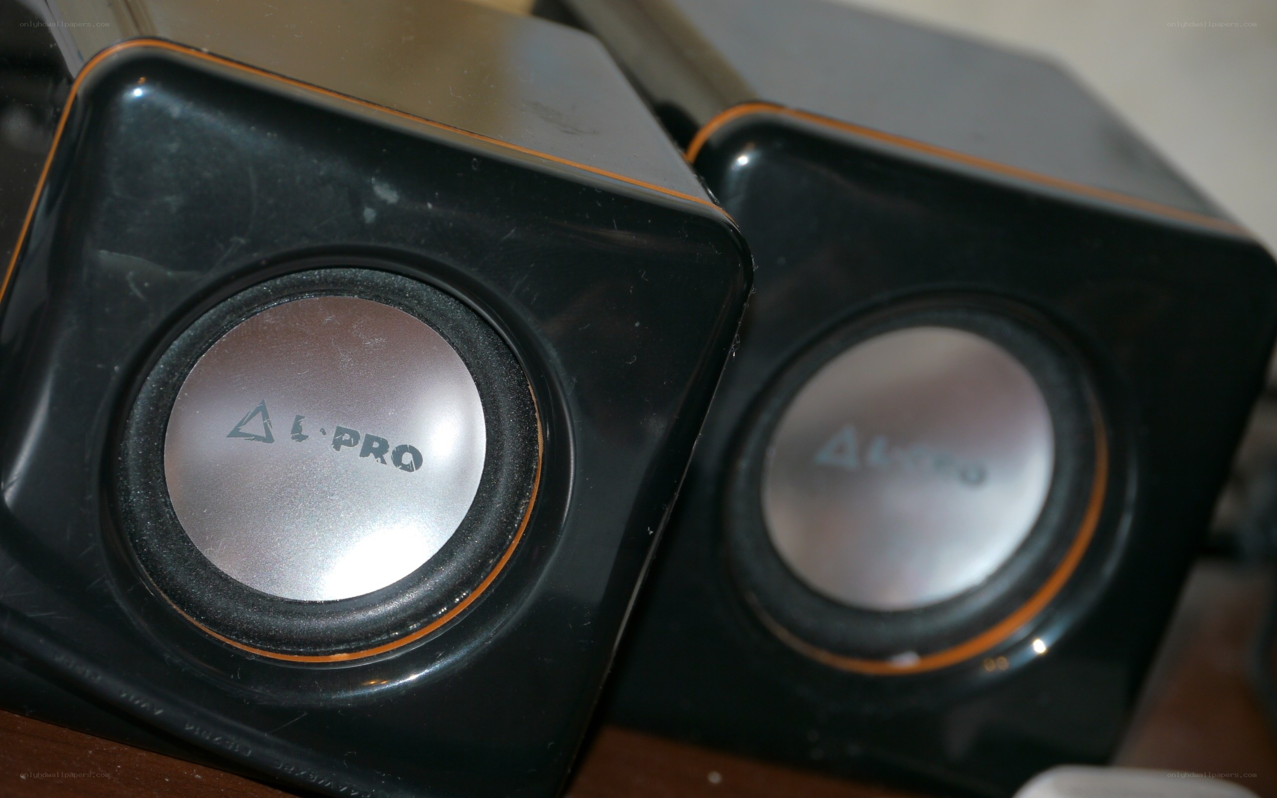 black speakers with silver cones
