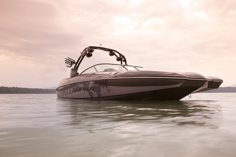 Black Speedboat on Water — Gray