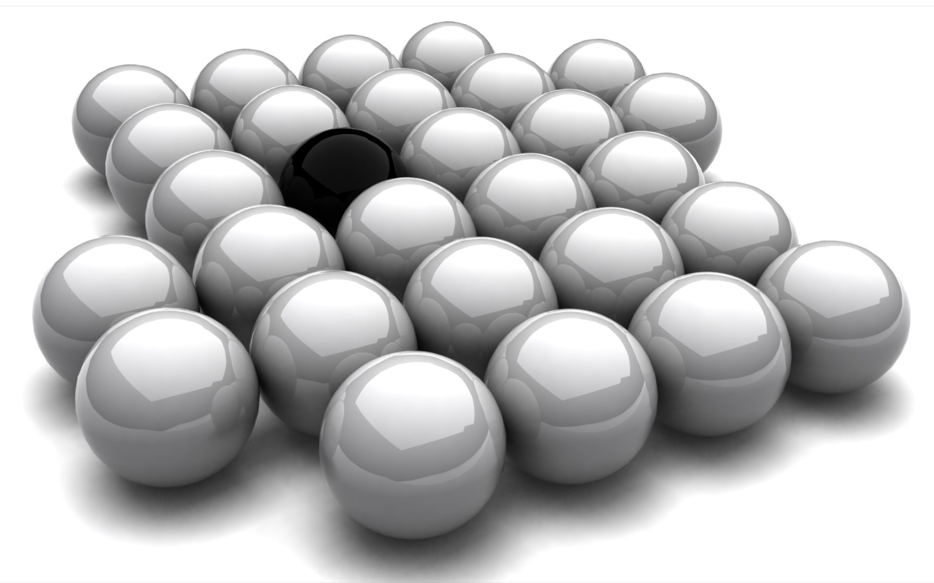 black sphere among white spheres