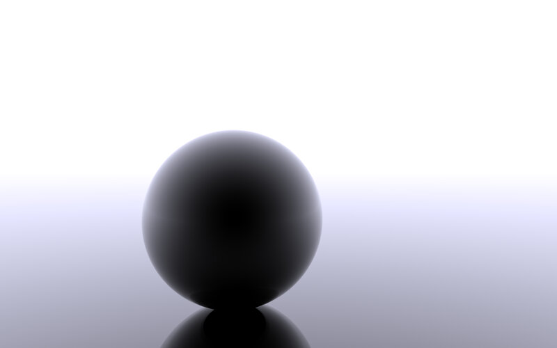 black sphere on reflective surface