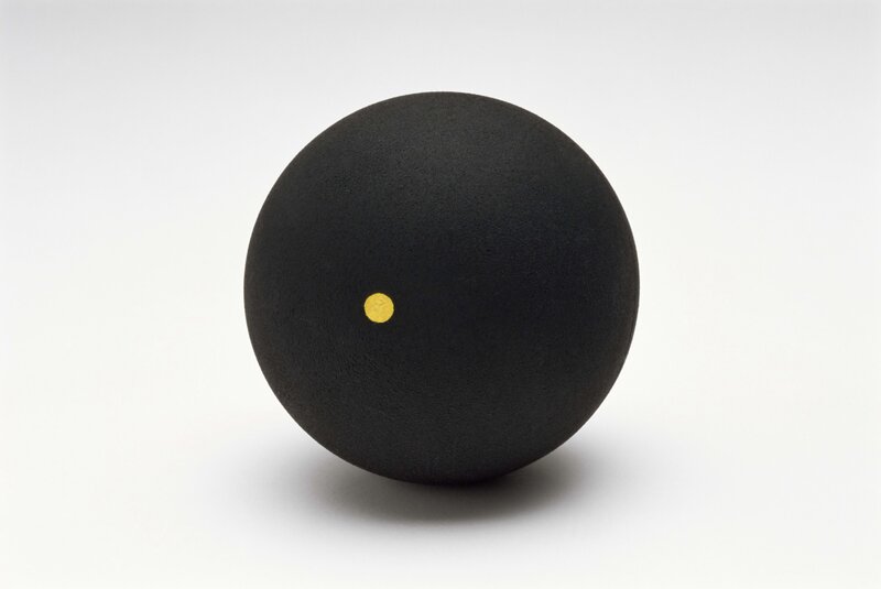 Black sphere with yellow dot