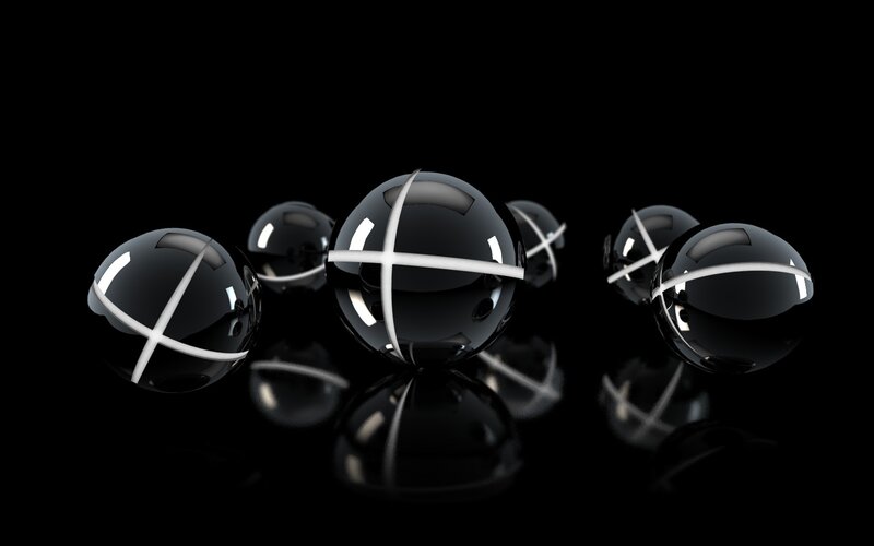 Black spheres with white crosses
