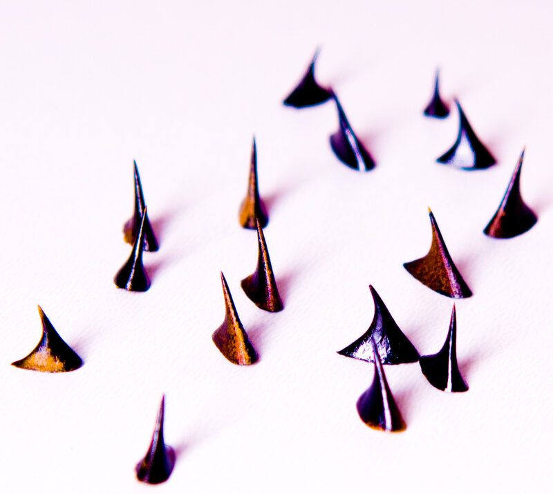 black spikes on white surface