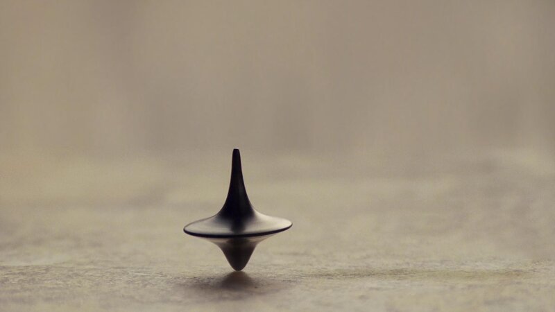Black Spinning Top — Calm