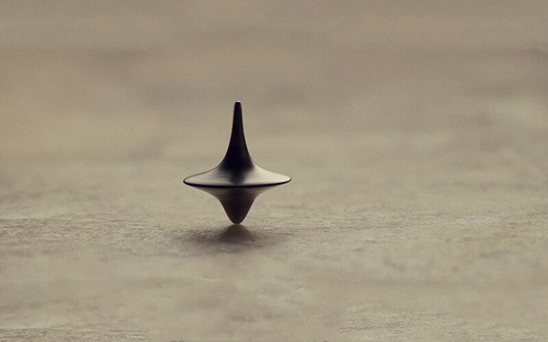 Black Spinning Top — Gray