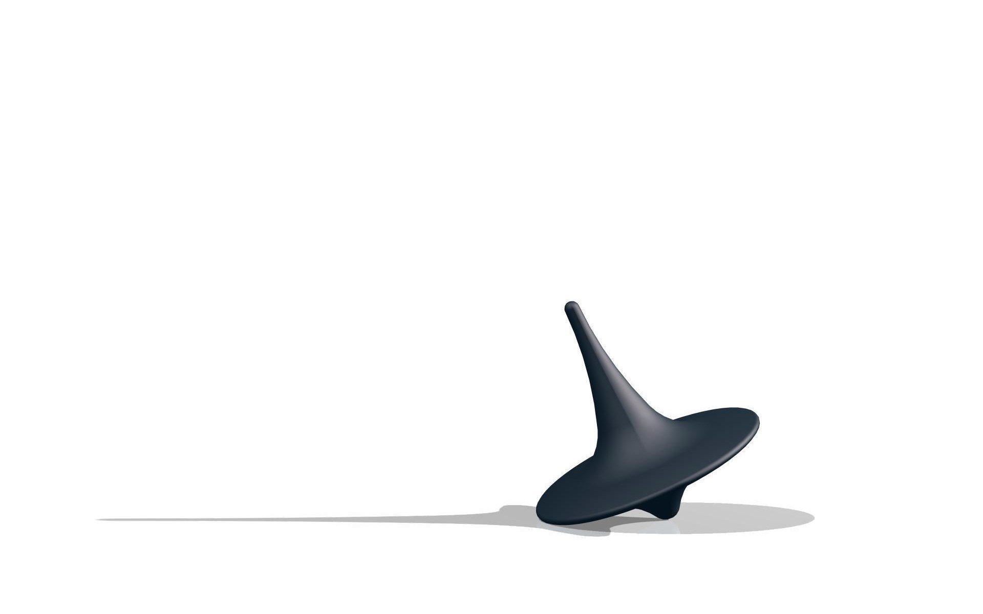 Black spinning top on white