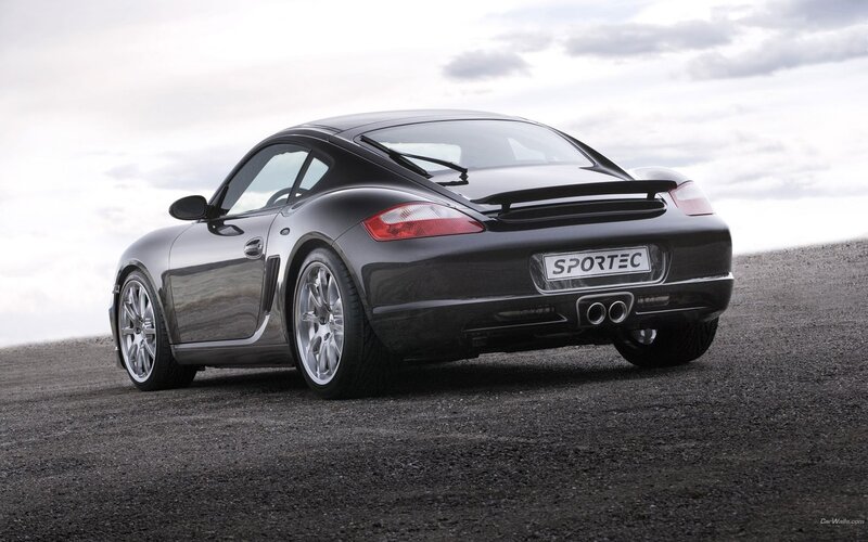black sport car on gravel
